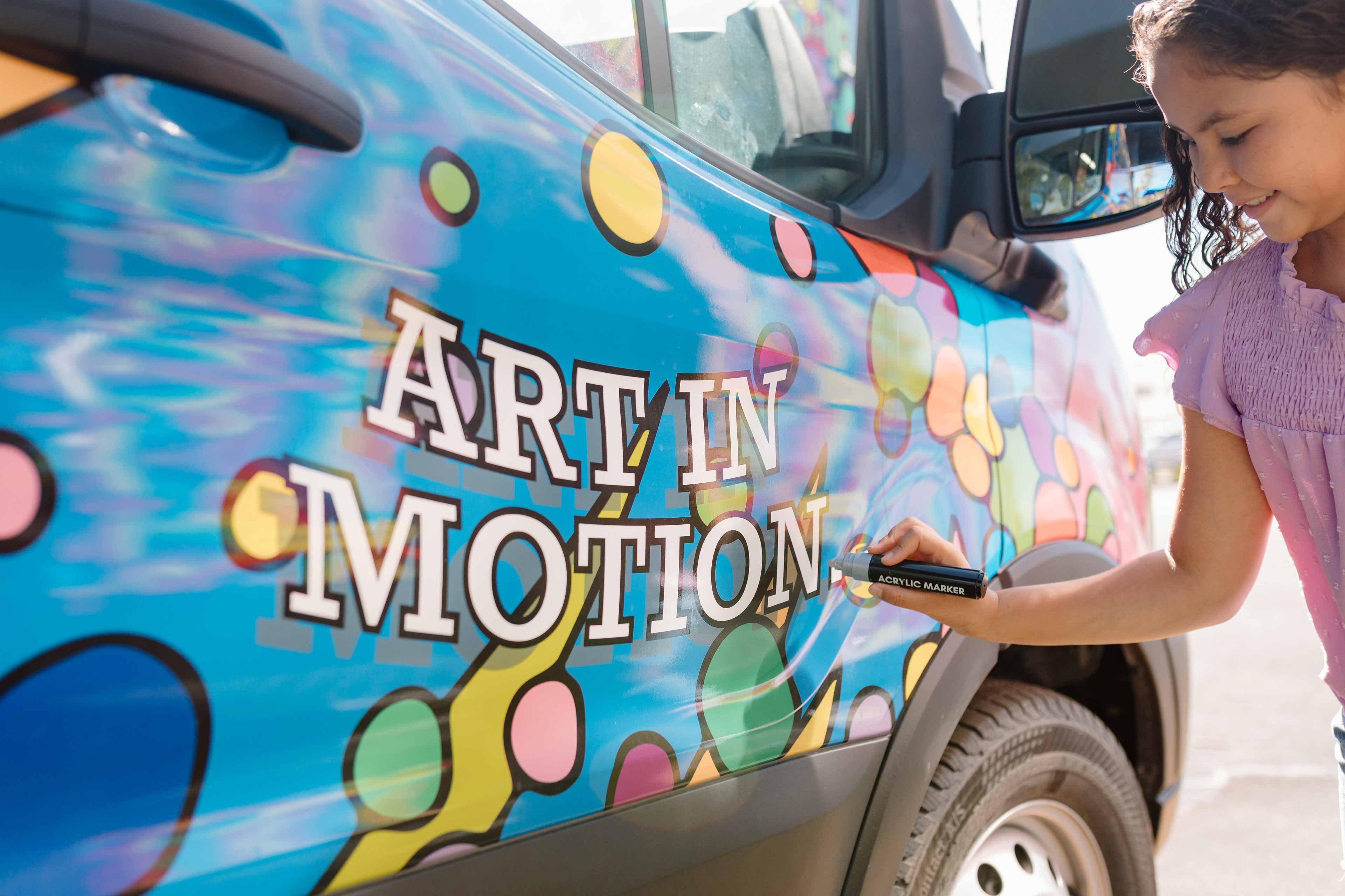 carson tahoe vehicle of change with text on top that reads Art In Motion